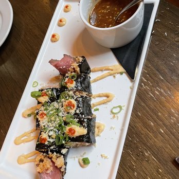 Swift's Attic signature dishes Popcorn and a PickleWarm Niman Ranch Pork CheeksDiver ScallopsBone Marrow﻿﻿﻿﻿﻿